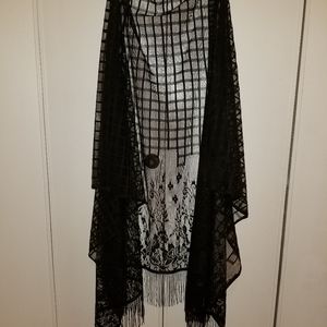 Black sheer vest with tassles. (NWOT)